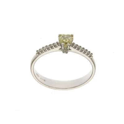 Solitaire ring with white diamonds 0.12 carats G-VS1 and fancy yellow heart cut diamond 0.48 carats FY-VS2