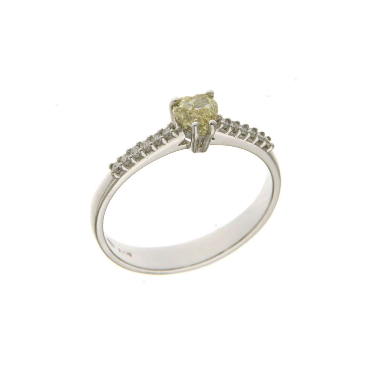 Solitaire ring with white diamonds 0.12 carats G-VS1 and fancy yellow heart cut diamond 0.48 carats FY-VS2