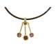 Leather and central necklace in lost wax yellow gold with garnet 2.86 ct