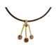 Leather and central necklace in lost wax yellow gold with garnet 2.86 ct
