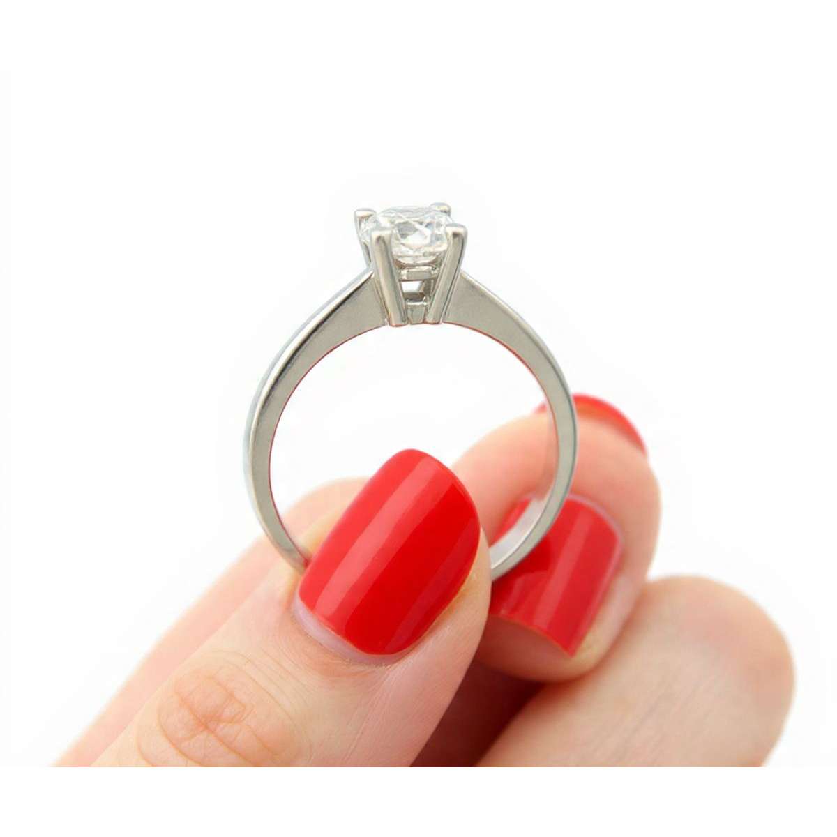 Anello solitario 4 griffe diamante certificato IGI ct 0.72 H-VVS2