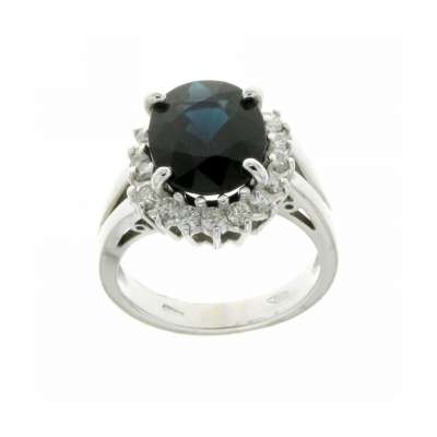 White gold ring central blue sapphire 5.20 cts. 0.62 carats diamonds frame G-VS1