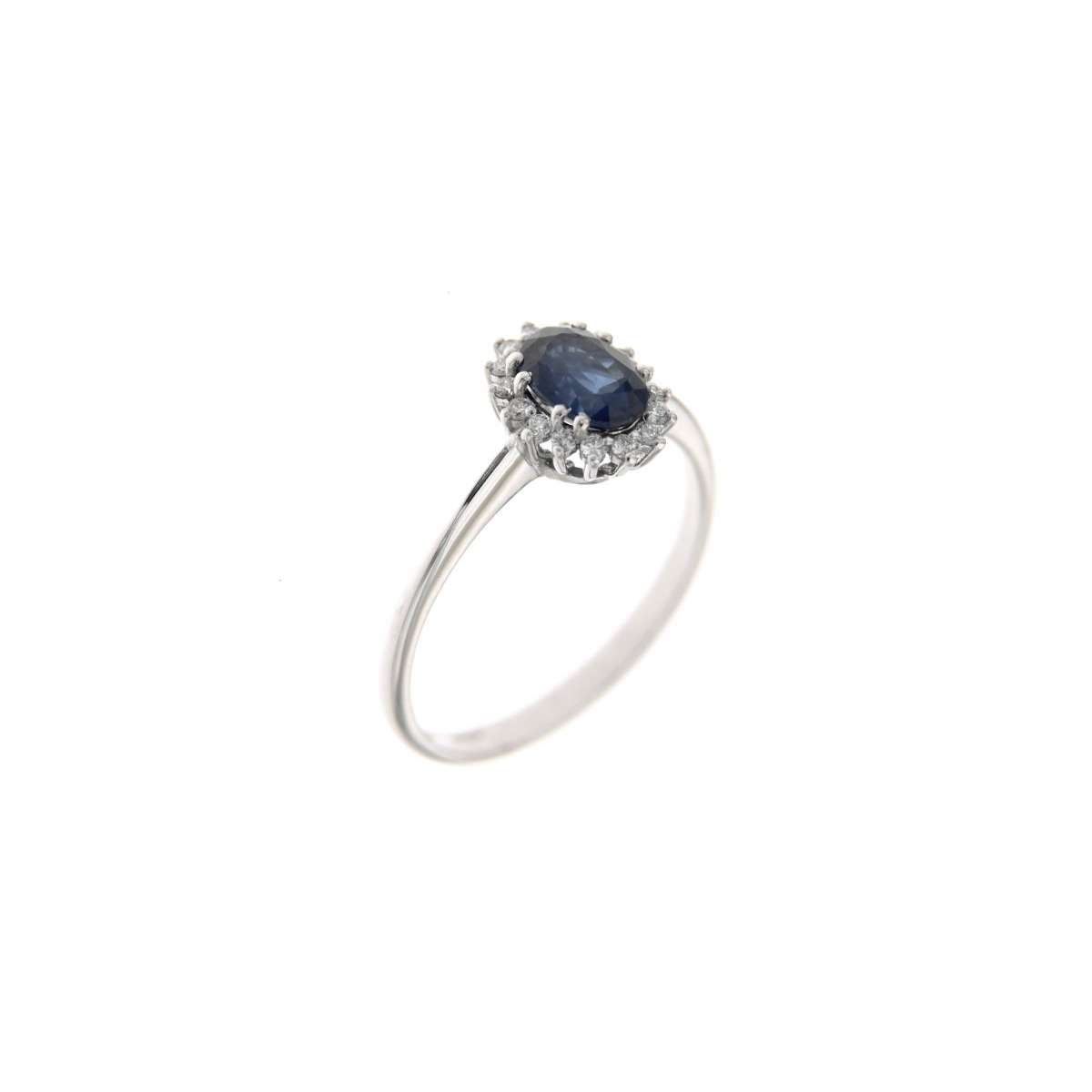 Ring with blue sapphire ct 1.04 and diamonds ct 0.15 g-vs1