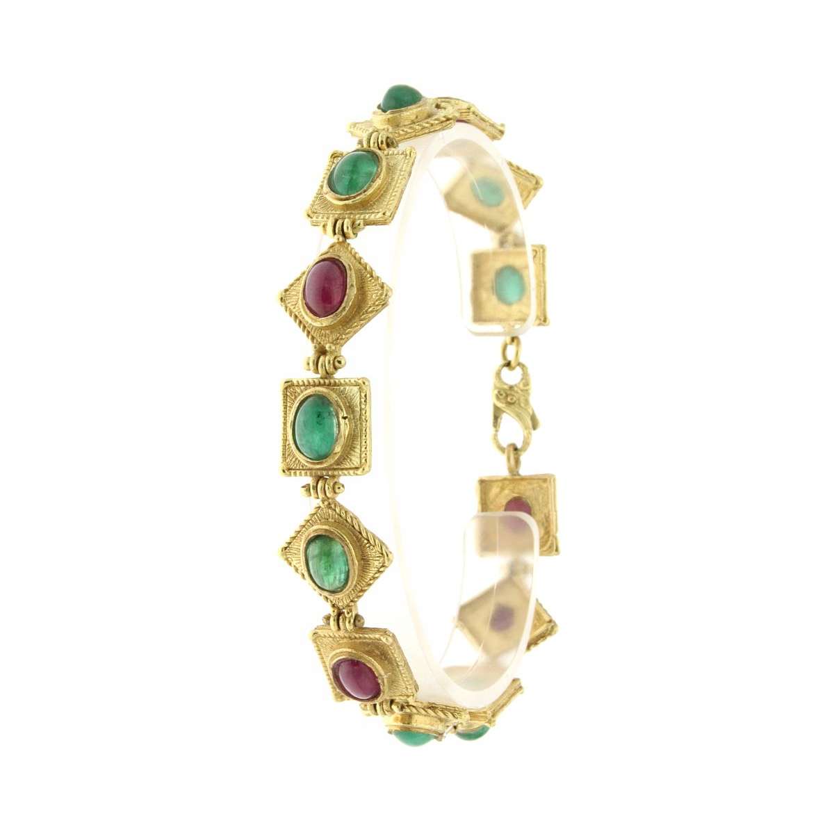 Lost wax casting bracelet with ruby and emerald root