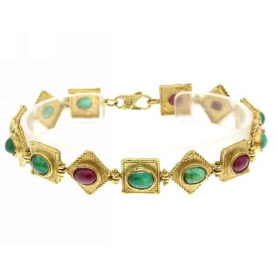 Bracciale in cera persa con smeraldi e rubini