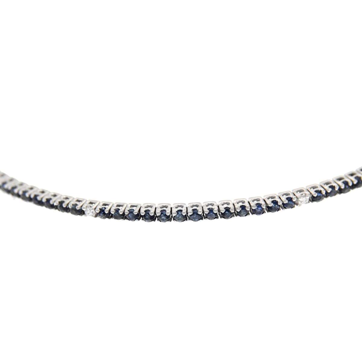 Tennis bracelet with 2.00 ct blue sapphires interspersed with 0.10 ct diamonds G-VS1