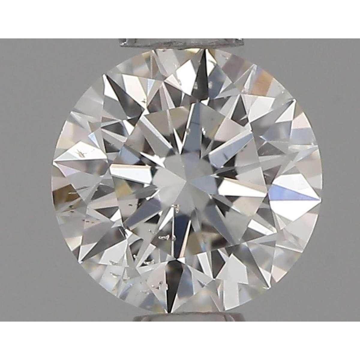 Diamante Certificato GIA Carati 0.4 Colore G Purezza SI2 EX EX EX Fluorescenza FNT Brown No Green No Milky No EyeClean 100% Diamante Certificato GIA Carati 0.4 Colore G Purezza SI2 EX EX EX Fluorescenza FNT Brown No Green No Milky No EyeClean 100%