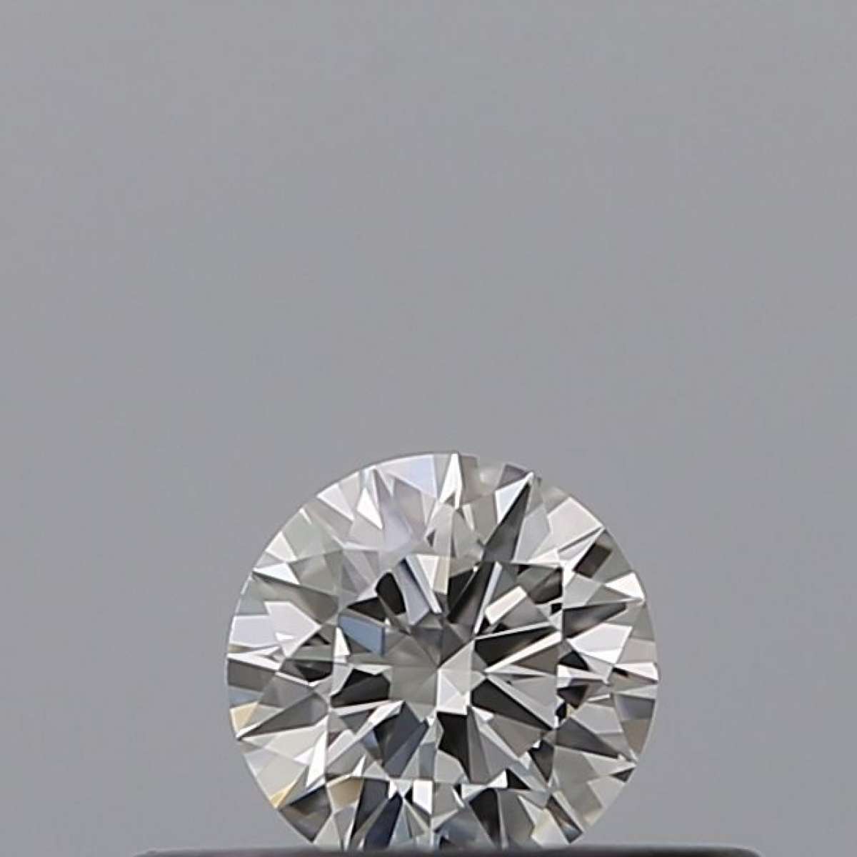 Diamante Certificato GIA Carati 0.19 Colore G Purezza VVS1  EX  EX  EX Fluorescenza FNT Brown No Milky No EyeClean 100%